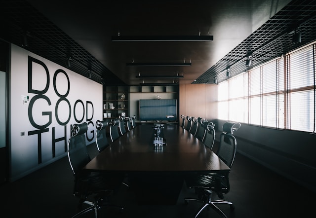 Conference room with Do Good Things on the wall.